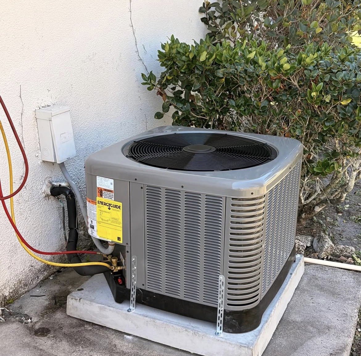 Outdoor condenser on concrete pad